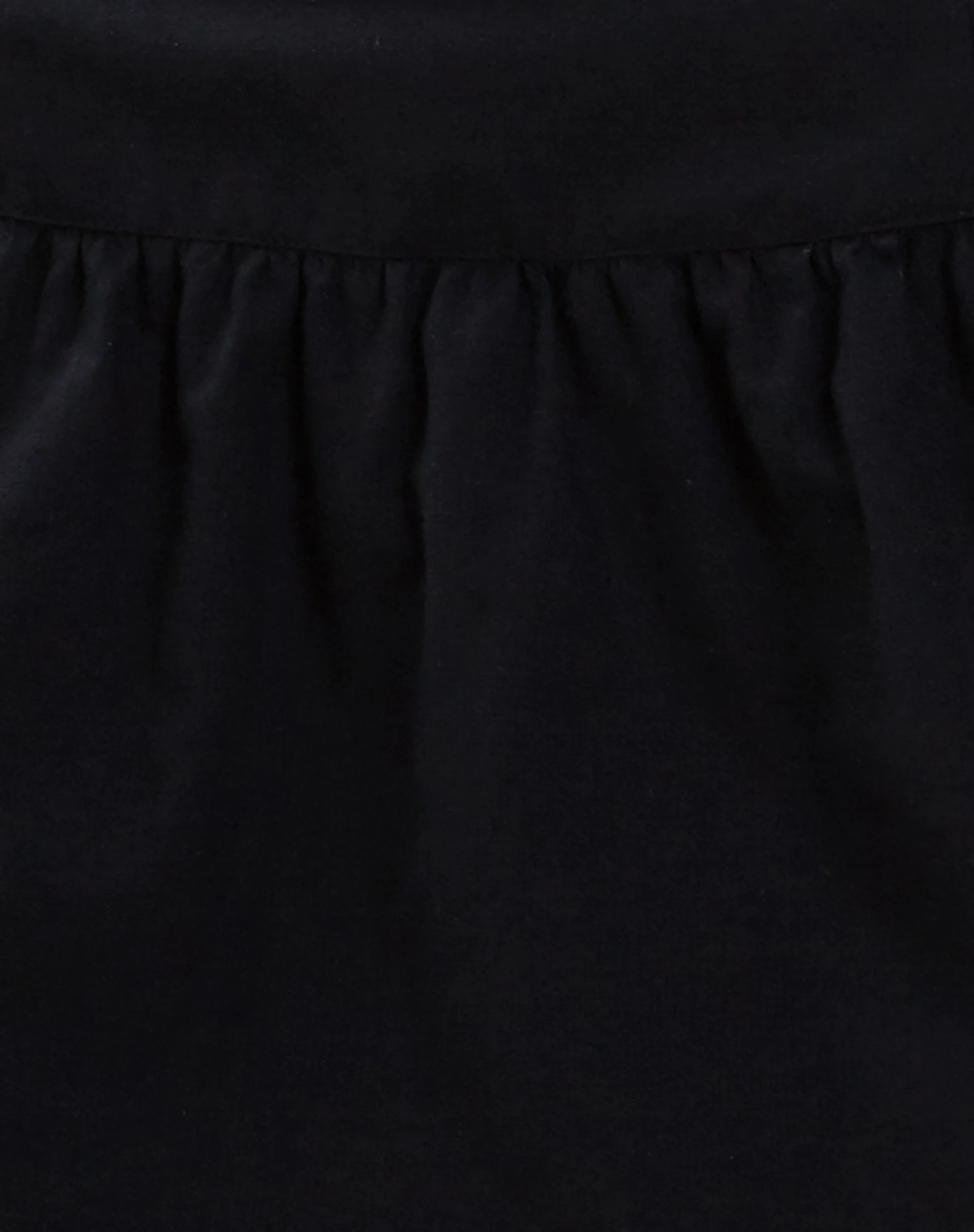 Adini Mini Skirt in Black Dobby - Image 5