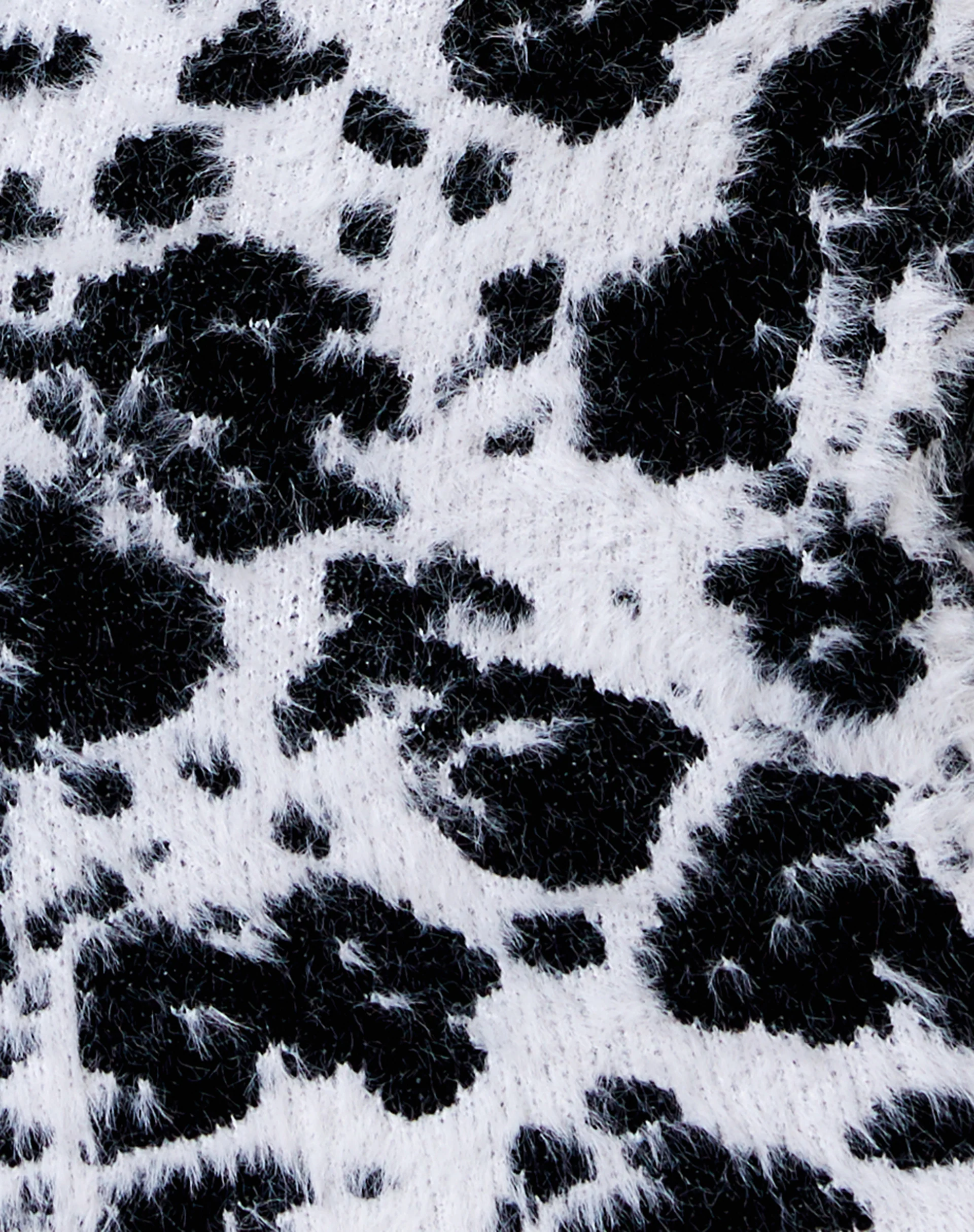 Aneli Mini Skirt in Fluffy Knit Cow Hide Black and White - Image 5