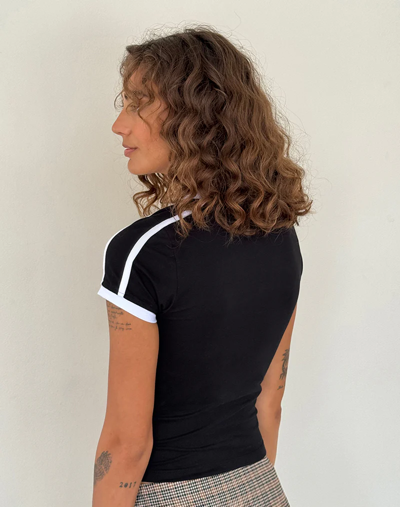Izolde Baby Tee in Black with White Binding and M Embroidery - Image 5