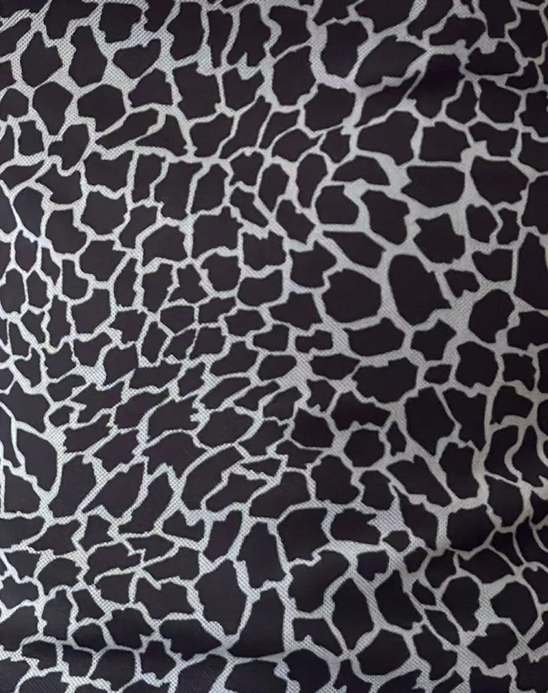 Jaridah Asymmetric Slouch Top in Giraffe Black and Cream - Image 6