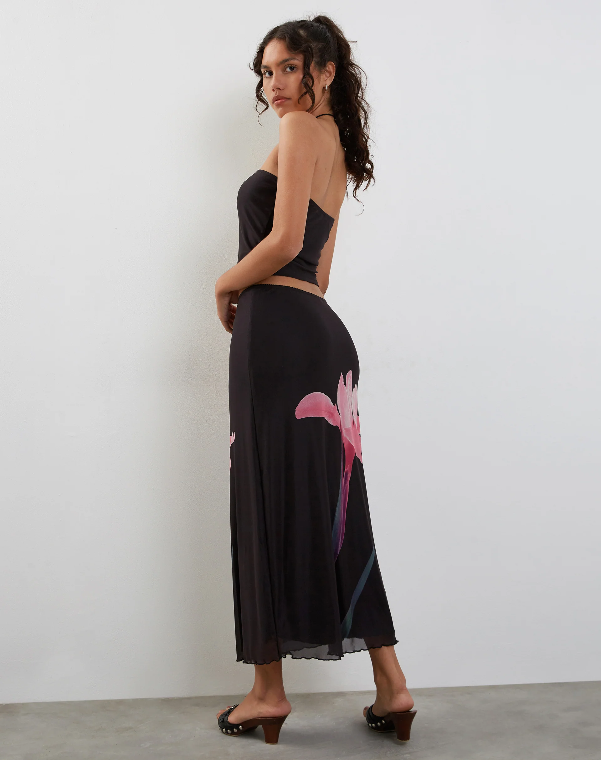 Lassie Midi Skirt in Black with Pink Flower Placement - Image 5