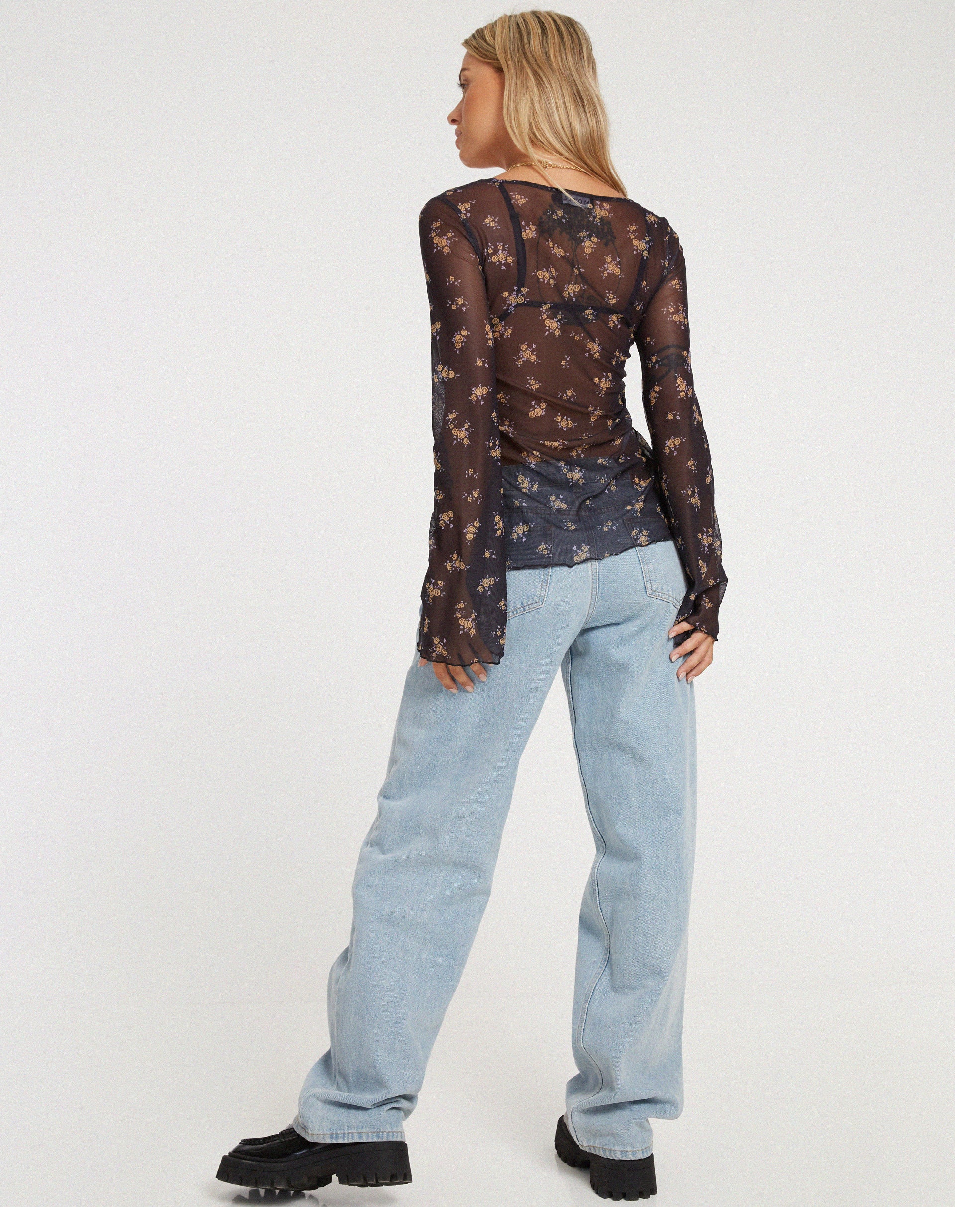 Leony Cardi in Femme Floral Black and Gold - Image 5