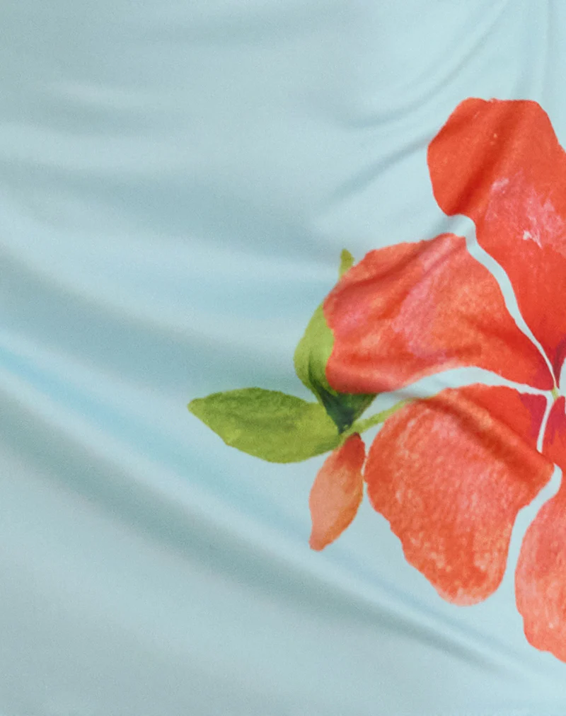 Nisrin Mini Skirt in Blue with Orange Flower - Image 6