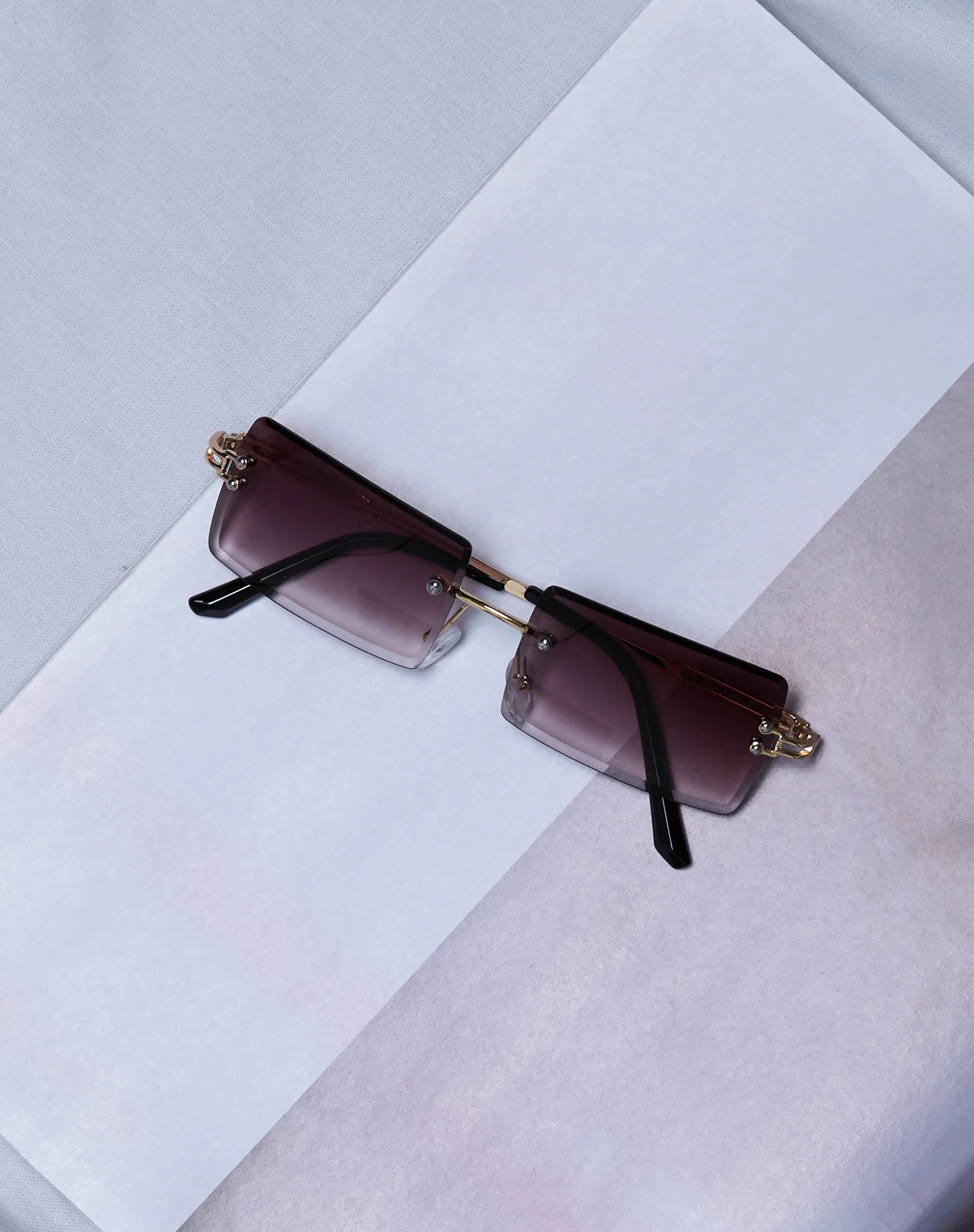 Yumi Sunglasses in Black and Gold - Image 2